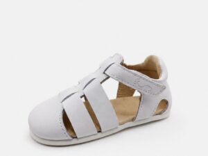 Sandalia cangrejera barefoot para niño Flexinens modelo 26H en piel blanca con cierre de velcro y suela flexible vista lateral